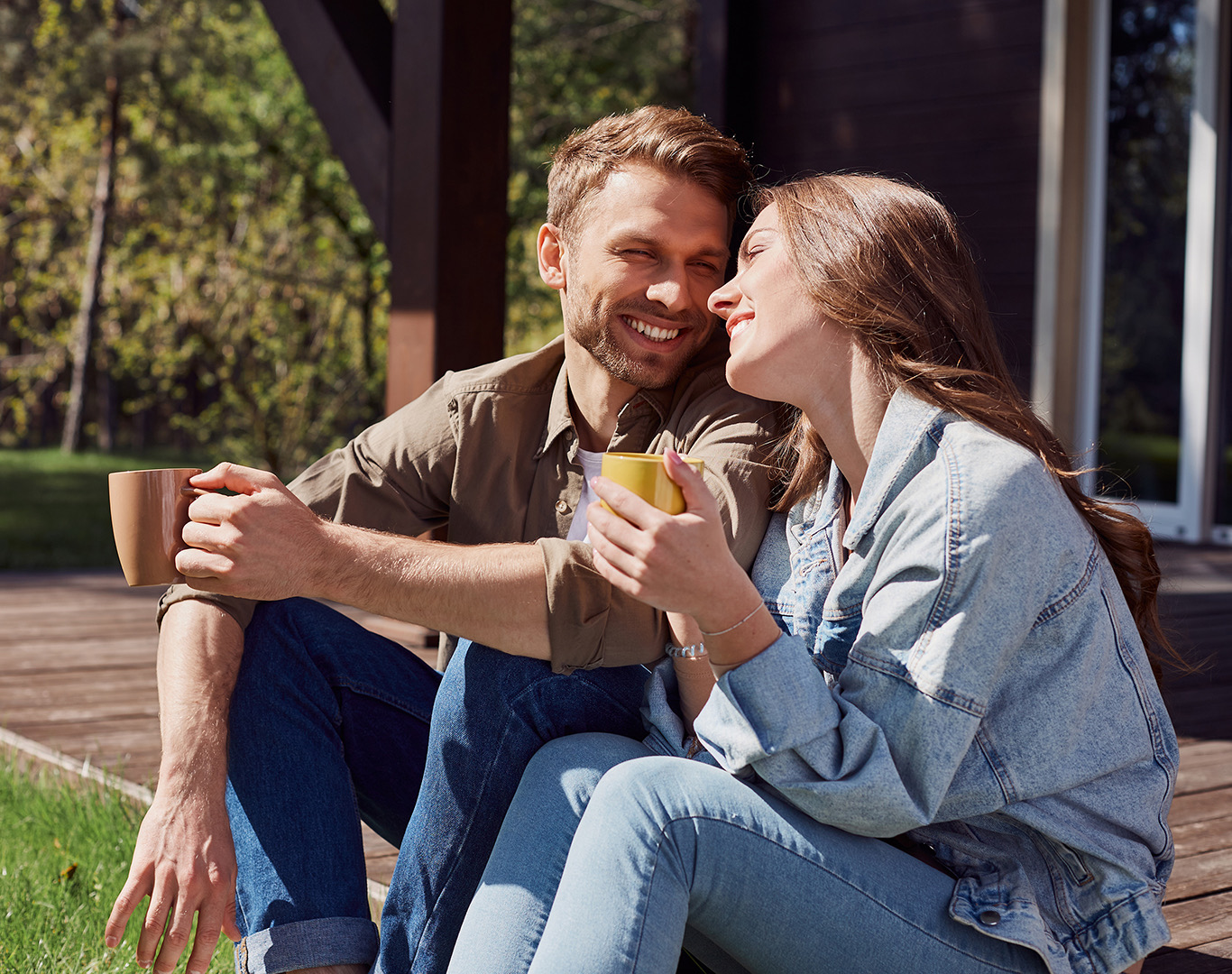 Couple enjoying coffee in their new home
