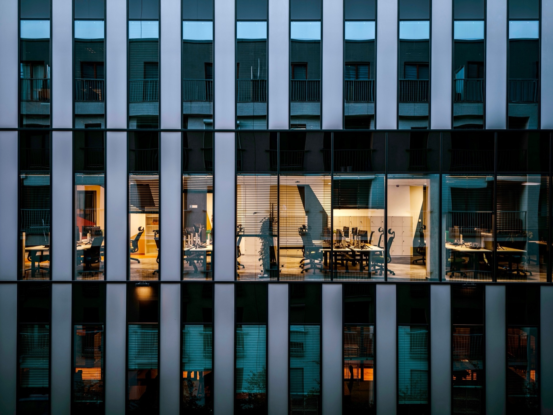 Modern commercial office building exterior with glass facade